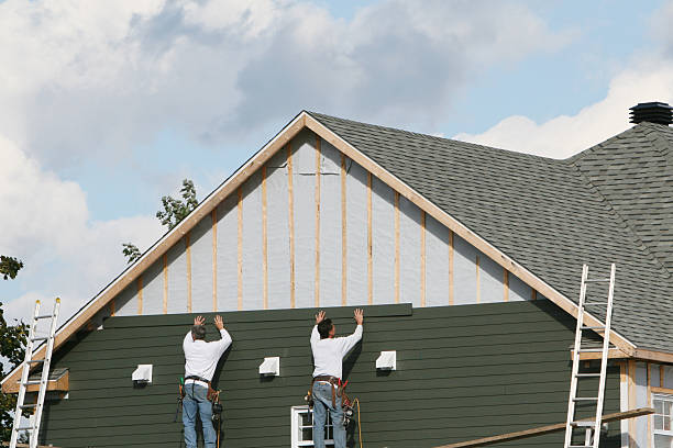 Professional Vinyl Siding technician working in Asbury Park, NJ